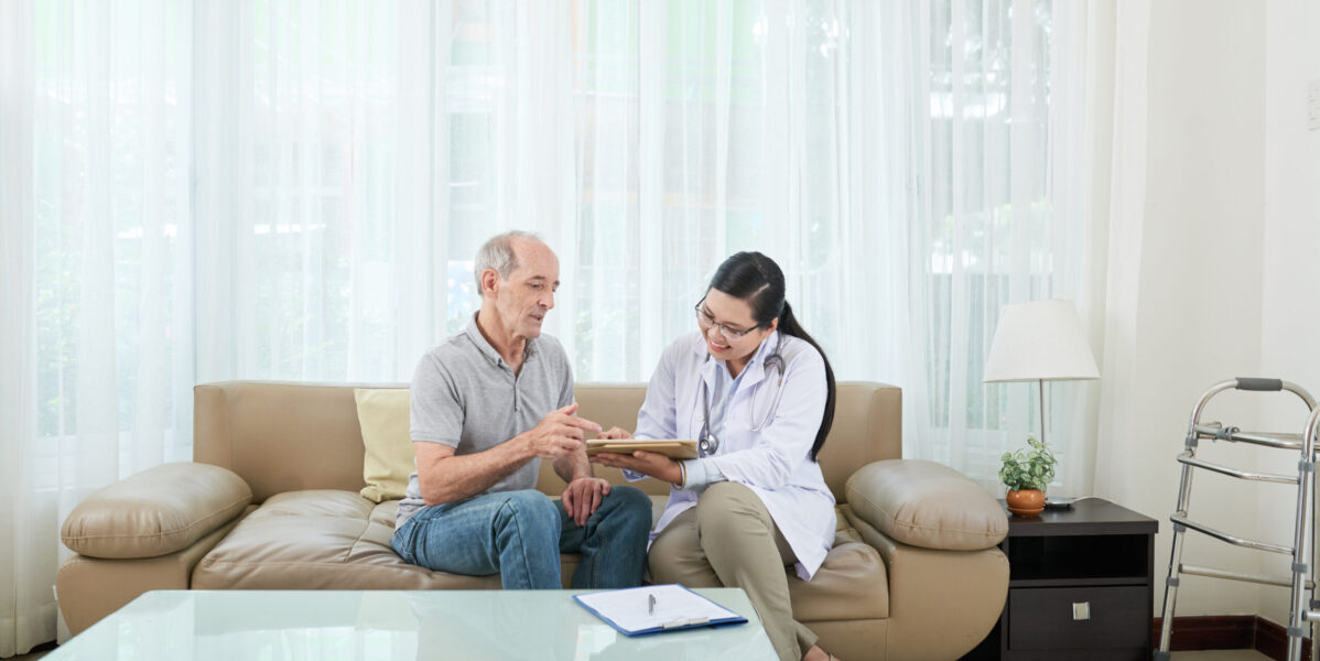 Professional doctor providing medical consultation at home in Sector 50 Noida